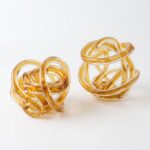 Hand Blown Glass Twisted Amber Knot - Image 2